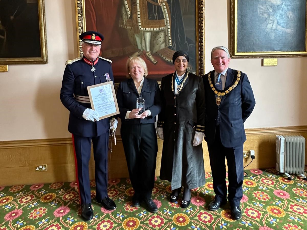 From left to right: Tim Cox, Lord Lieutenant of Warwickshire; Sue Hart of The Graham Fulford Trust; Rajvinder Kaur Gill, High Sheriff of Warwickshire; and Councillor Christopher Kettle, Chair of Warwickshire County Council.