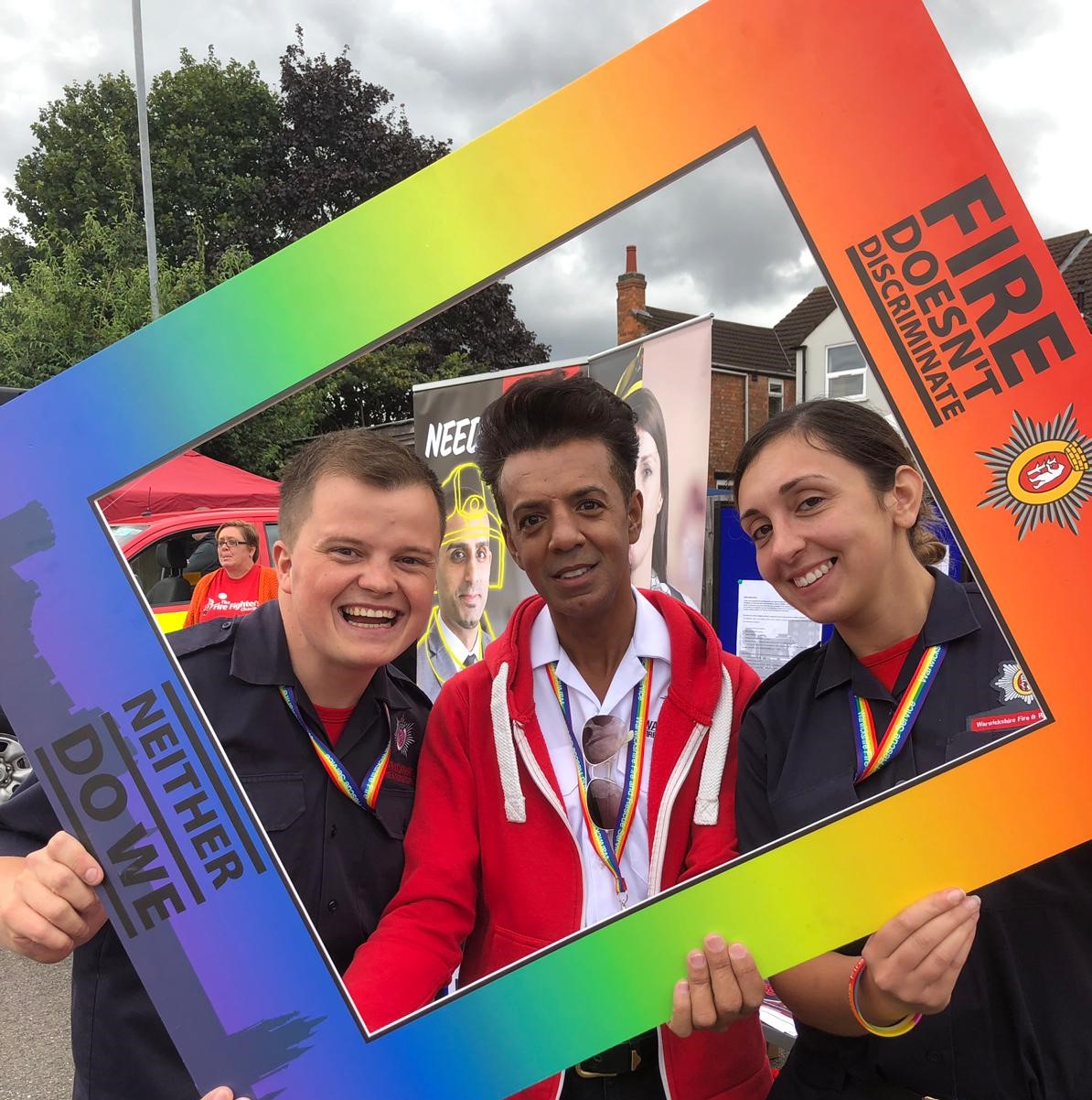 A picture of Imran Dean with colleagues at Warwickshire Pride 2019