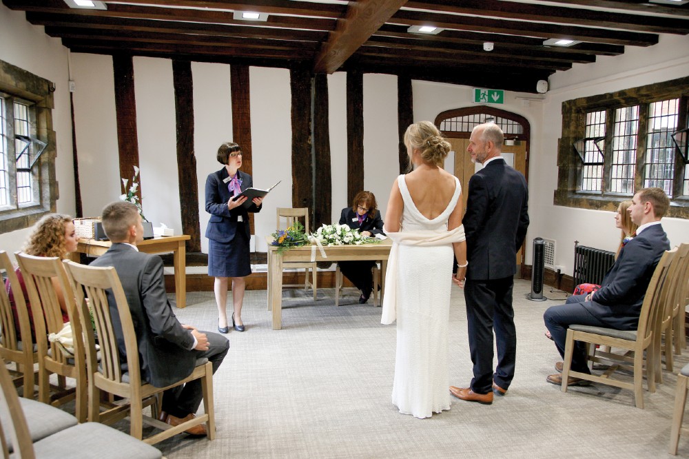 Couple getting married at Henley Room