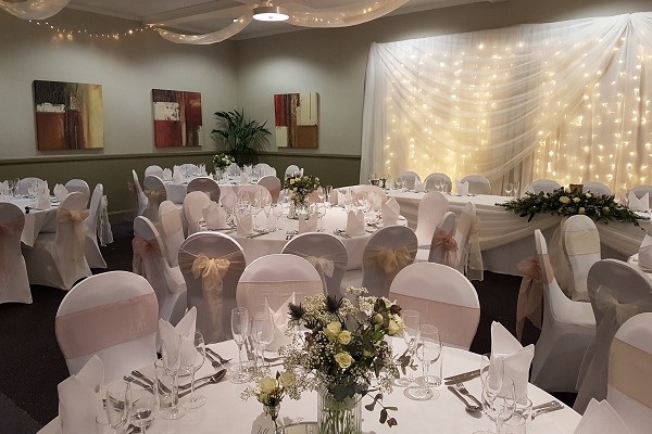 The Warwickshire Golf &amp; Country Club decorated for a wedding ceremony