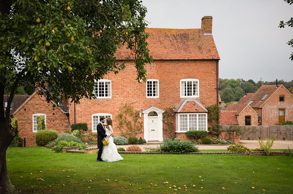 Bride and Groom stood outside Wethele Manor
