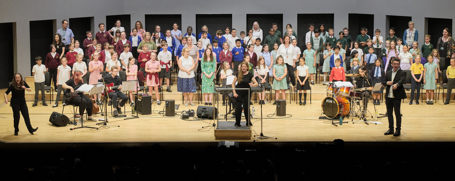 Photo of a group of children singing