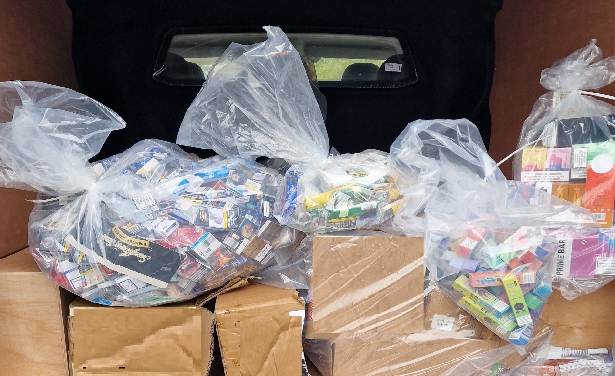 Boxes of cigarettes in a van.