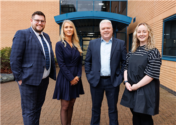 Four people from Leamington Spa-based software company CAE Tech.