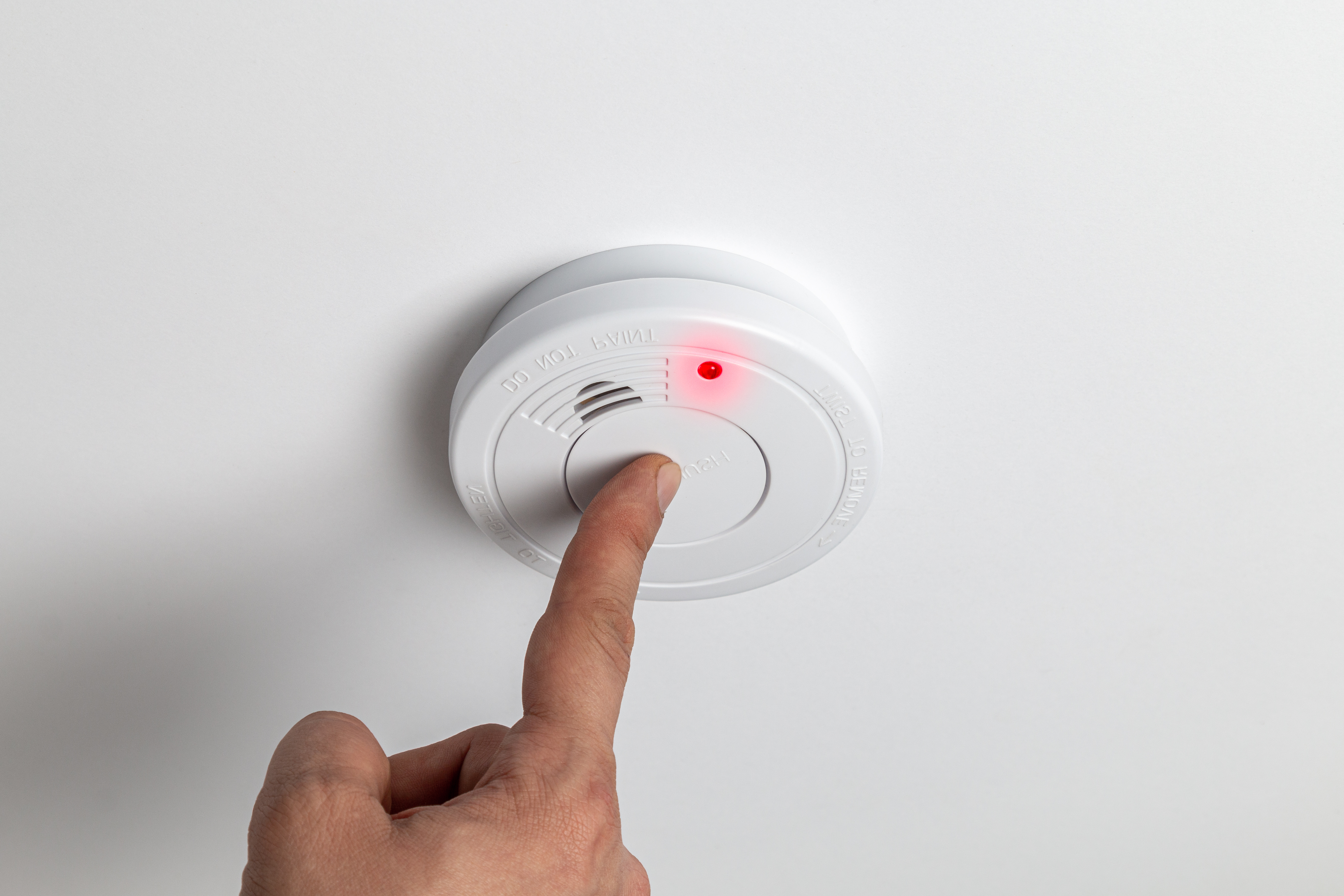 A smoke alarm being tested