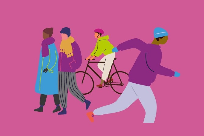People walking, someone running and someone cycling