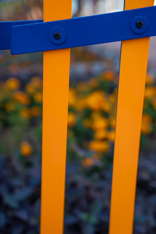 Metal bars, orange and blue.