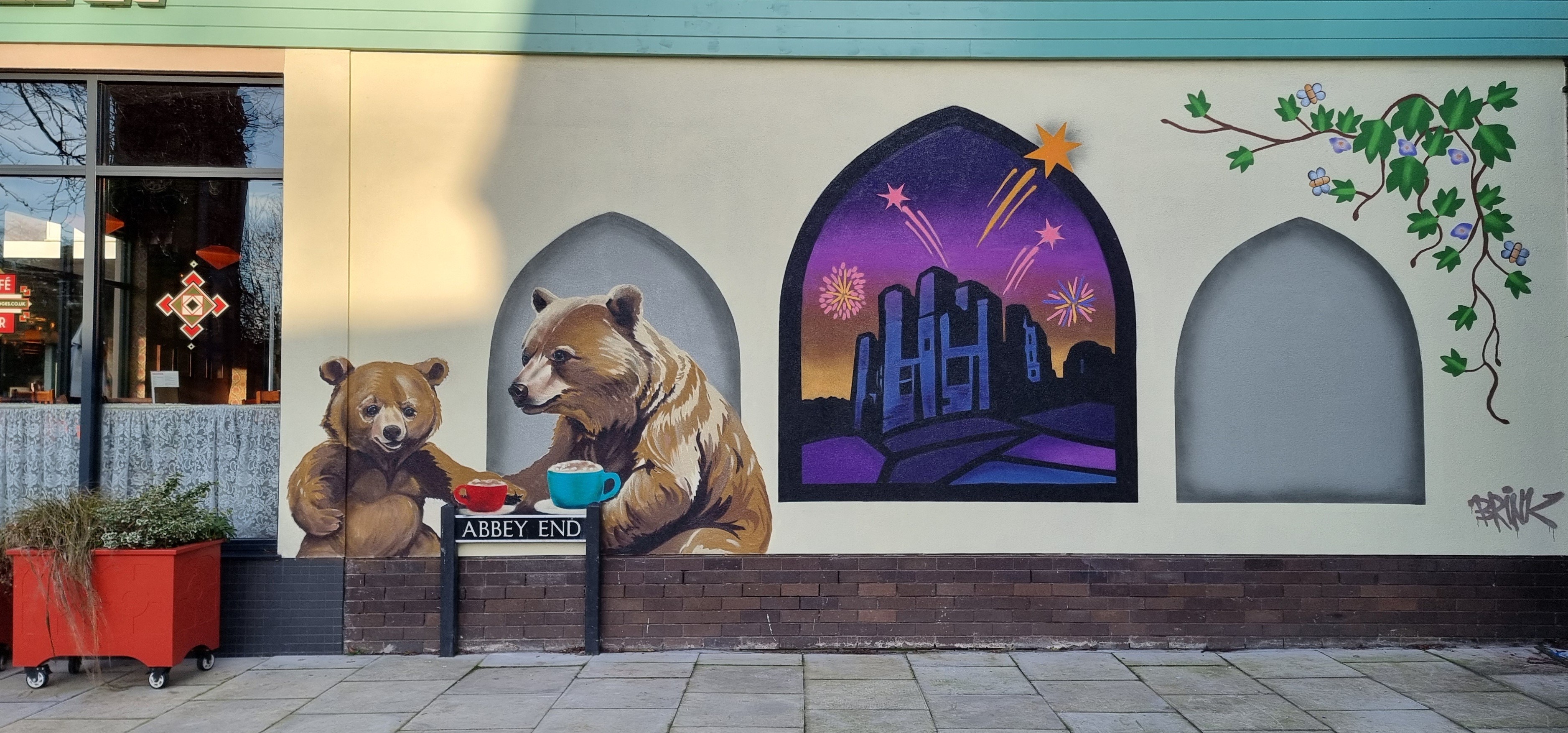 The mural at Abbey End, Kenilworth featuring two bears drinking hot chocolate, fireworks at Kenilworth Castle and Kenilworth ivy
