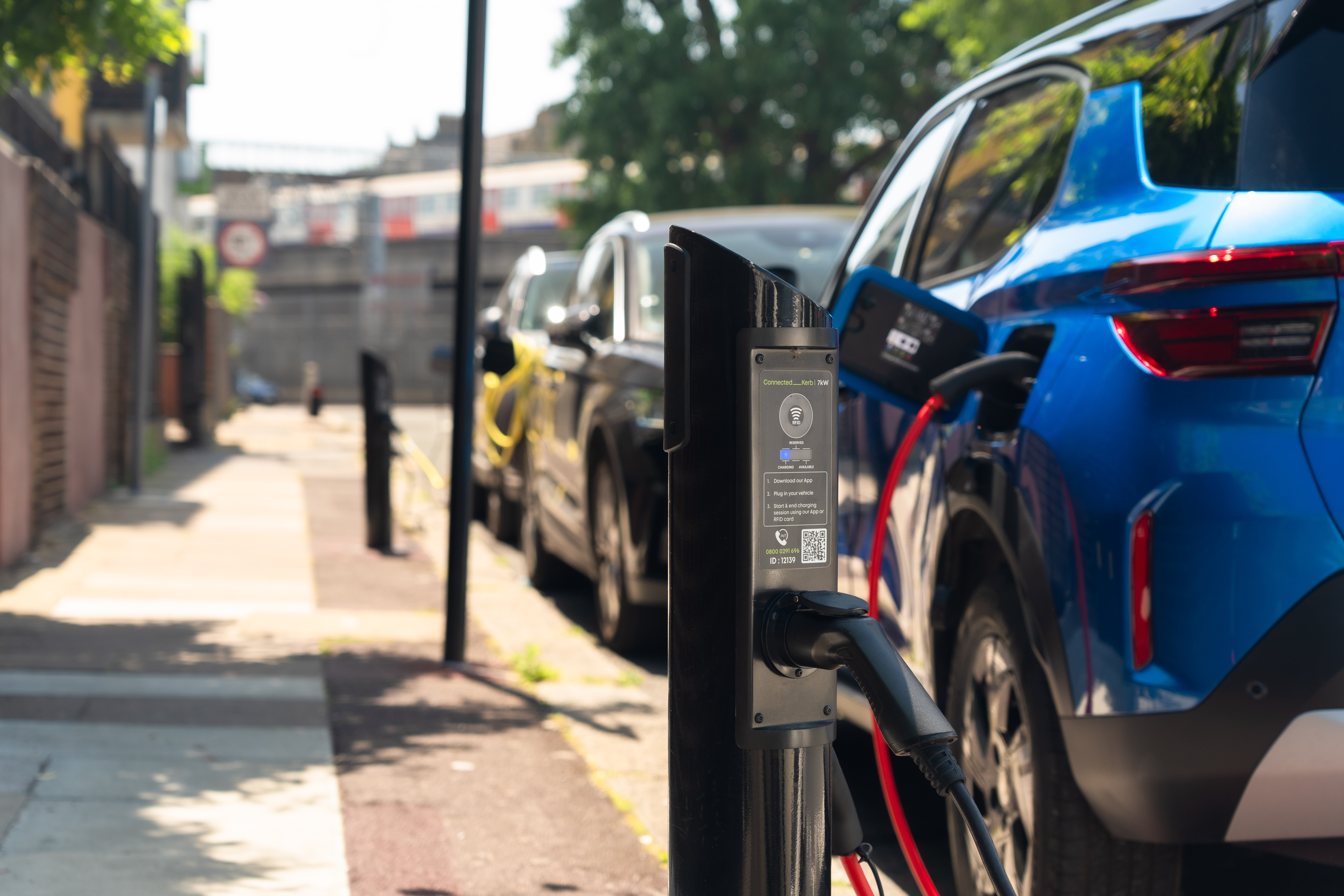 Row of EVs charging