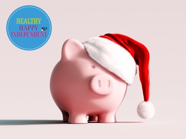 Image of a piggy bank with a christmas hat