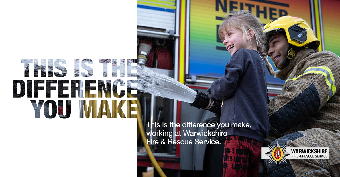 Firefighter and little girl use fire hose with text &#039;This is the difference you make working for Warwickshire Fire &amp; Rescue Service&#039;