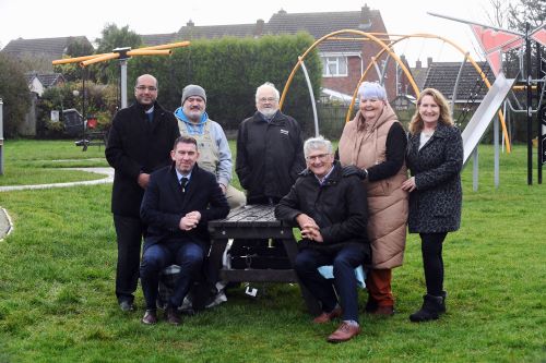 Group of people on benches