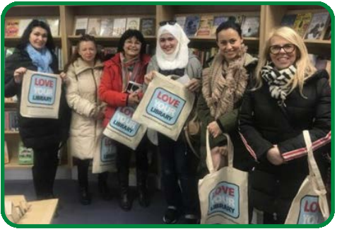 Students on the ESOL course pictured with bags