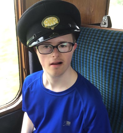 Young person on a train