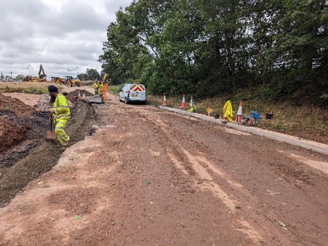 Image showing workmen and the start of construction of a new access track