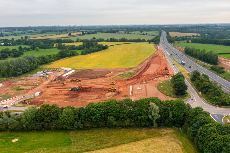 Aerial shot of A46 works site between green fields.