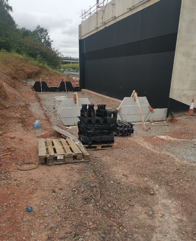 Figure 3 the first level of panels being installed behind the abutment