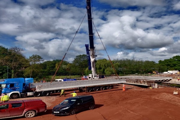 Figure 3 – Westley Bridge – Lifting the Concrete Beams onto the Abutments with a Crane