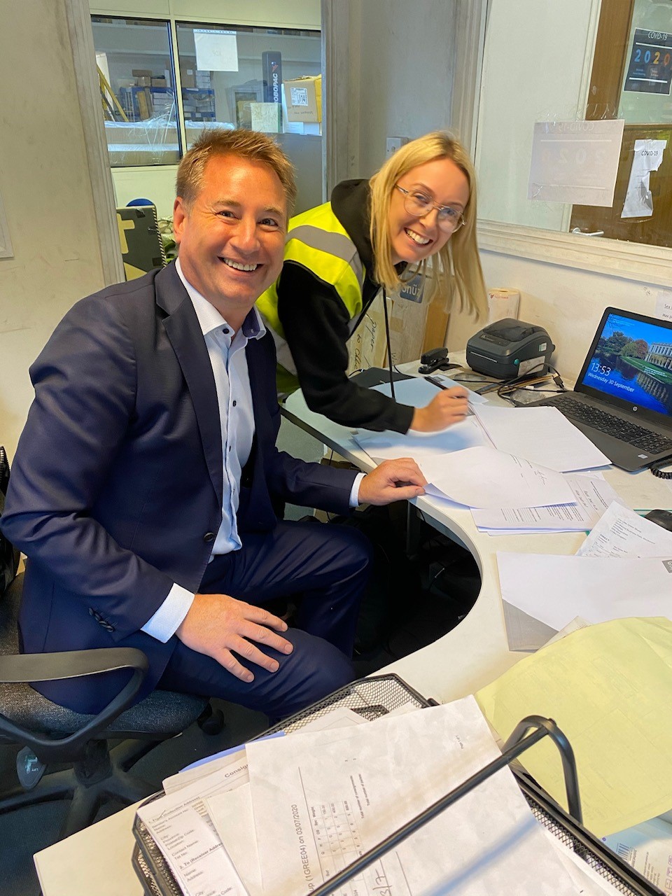 Roger Allen, CEO at Green Sheep Group, and Rosie Pritchard, Operations Director at Green Sheep Group, completing the KAE application form.