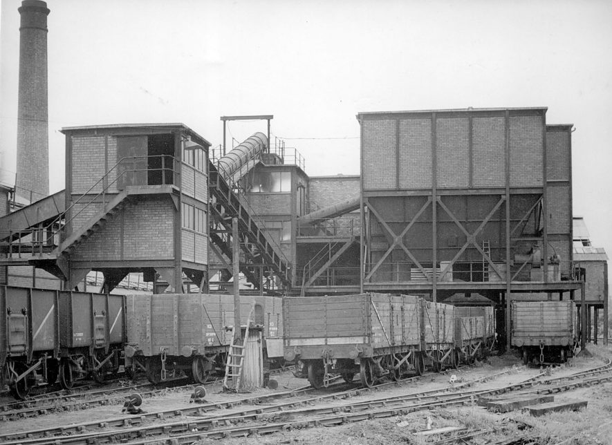 Black and white photograph of train carriages waiting at Griff Colliery