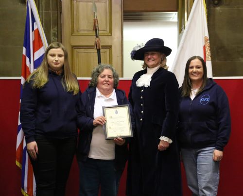 Sophie Hilleary, High Sheriff of Warwickshire, with representatives from the Girls Friendly Society, which was presented with a High Sheriff award for 150 years of supporting girls and young women in Atherstone.
