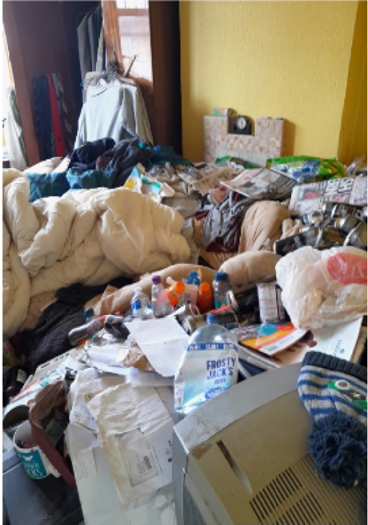 Hoarding: Harry's* bedroom before it was cleared