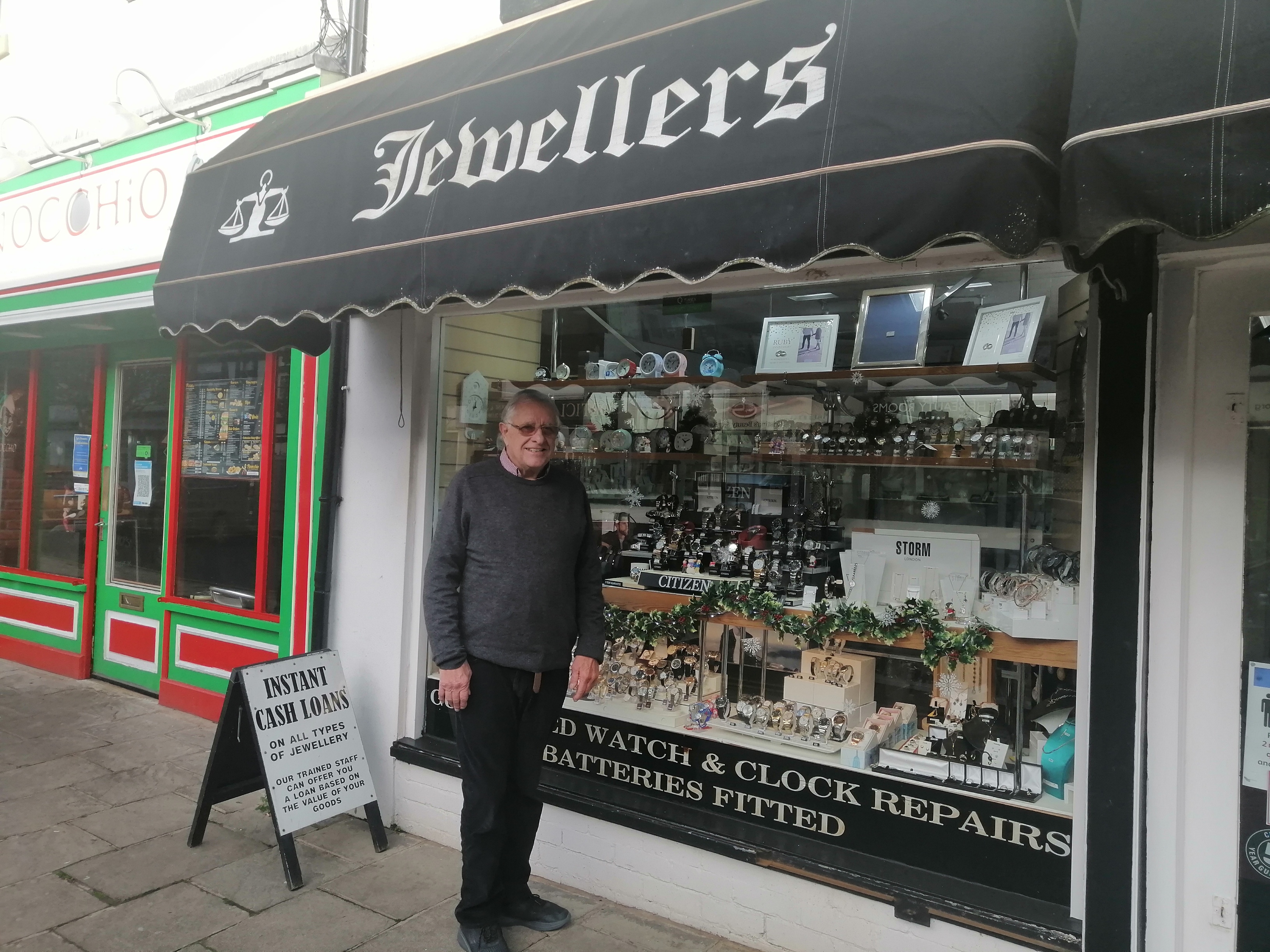 Alan Carter, owner of Atherstone Jewellers outside storefront