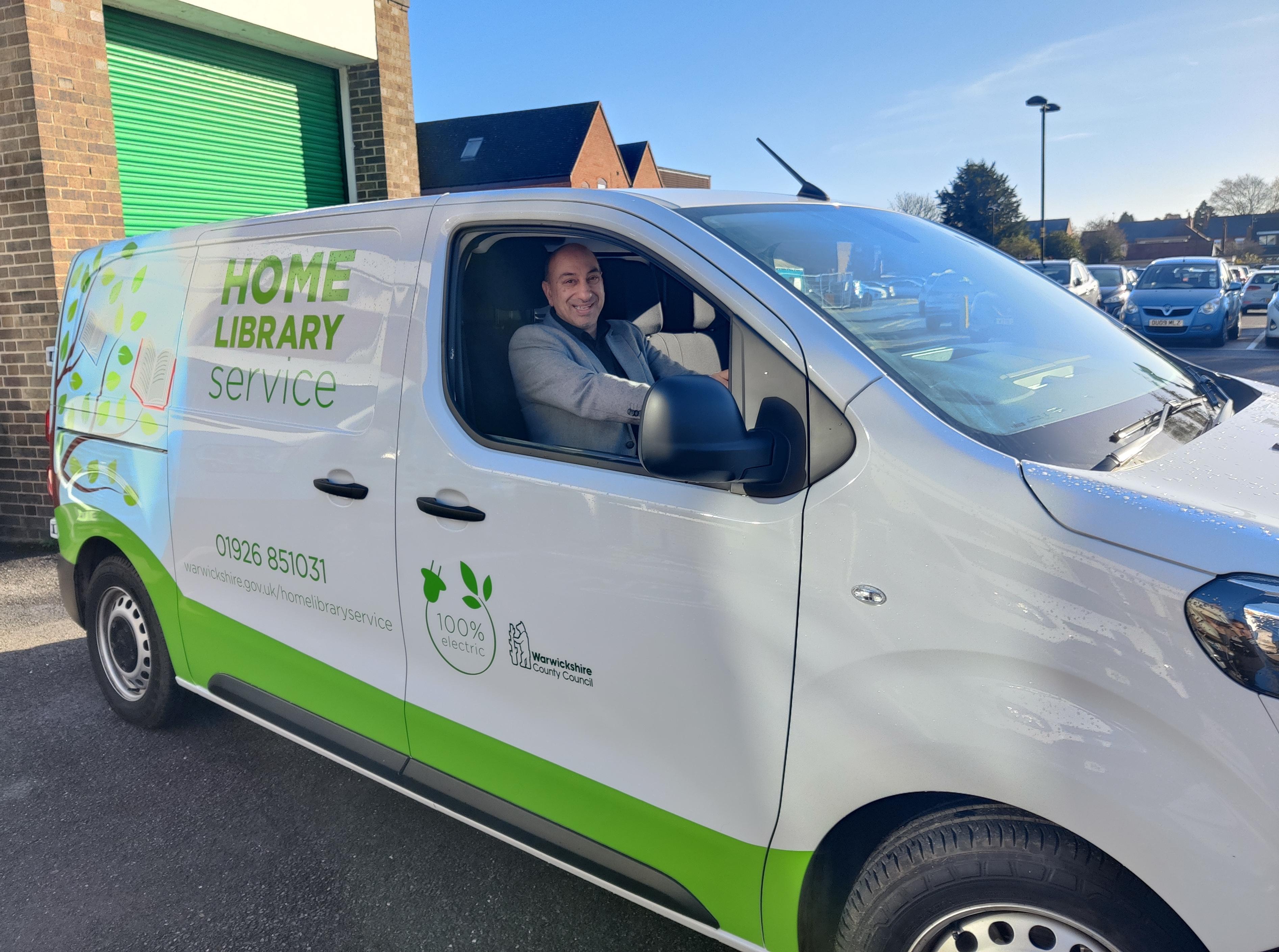 Ayub Khan, Head of Libraries and Face to Face front-line services at Warwickshire County Council, with the new van.