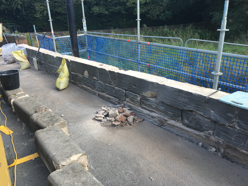 Damaged parapet wall