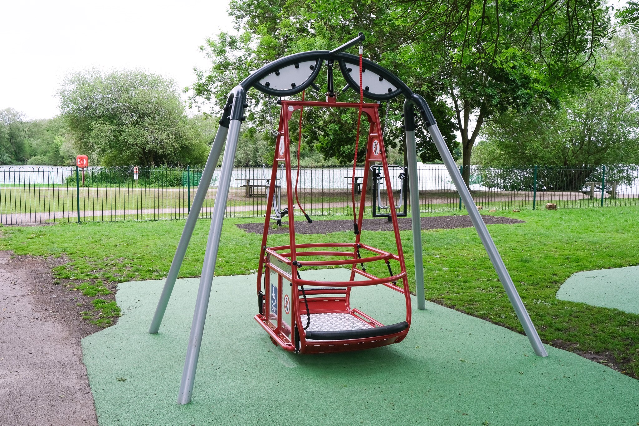 Image of a wheelchair accessible playground swing