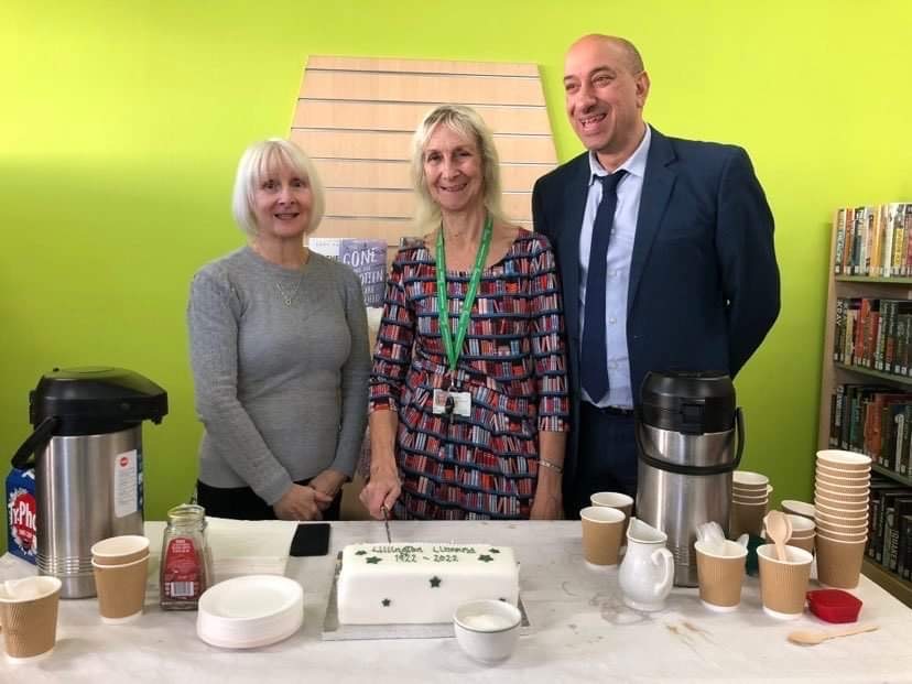 (From left to right) Liz White, Gill Colbourne, and Ayub Khan from the Warwickshire Libraries team next to Lillington Library’s centenary cake.