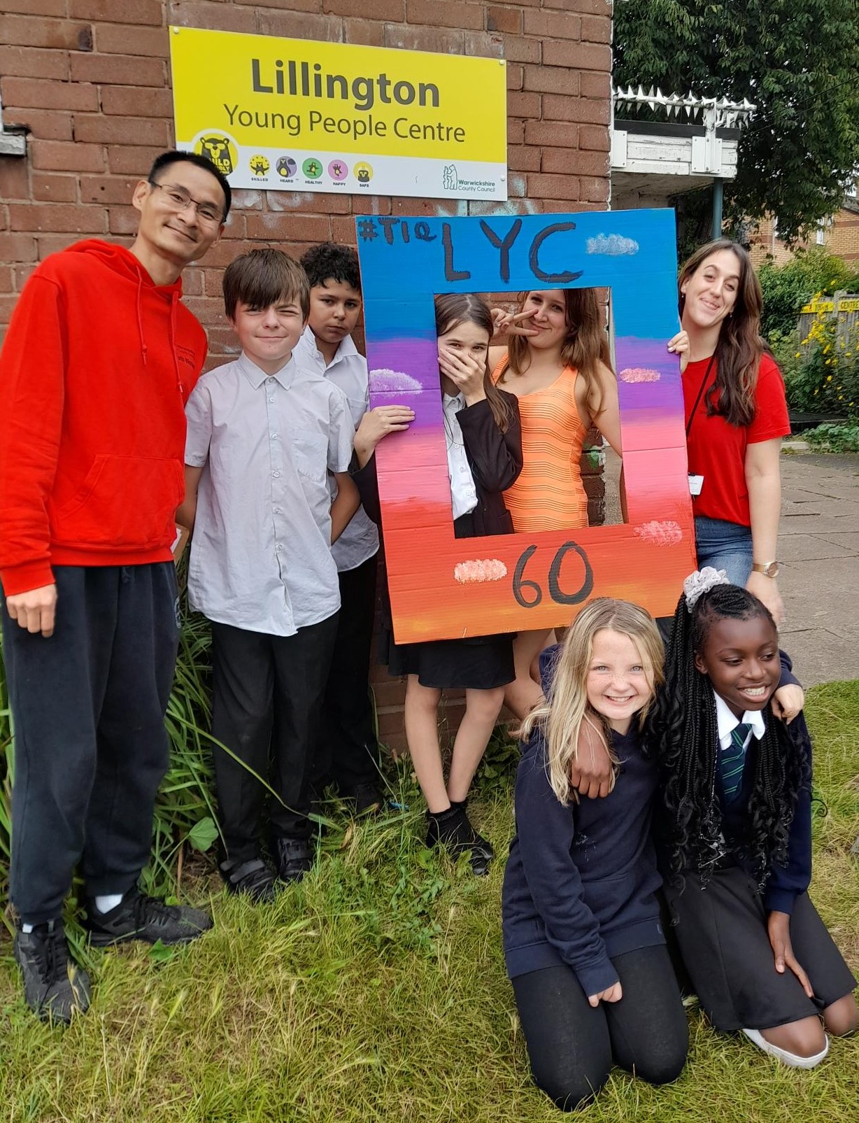 Children and young people gathered in front of Lillington Youth Centre
