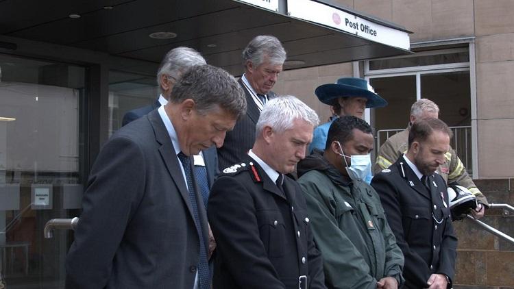 Officers hold minutes silence