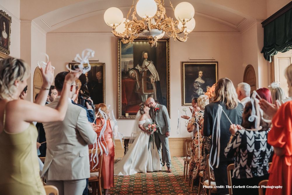Couple celebrating marriage in grand room