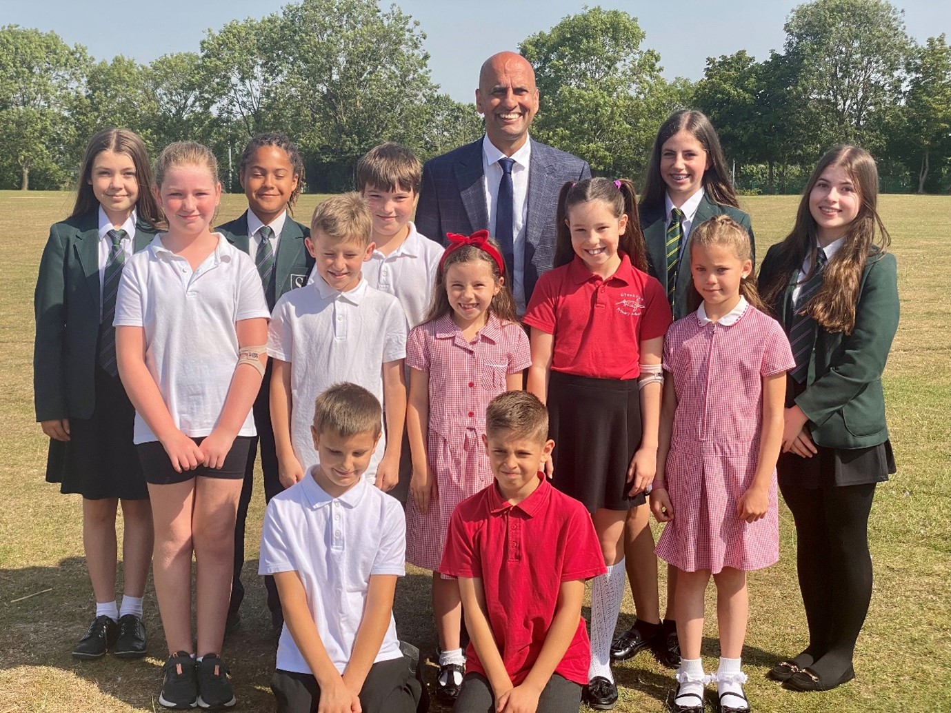 The Headteacher at Oakley Grove with Pupils from the school