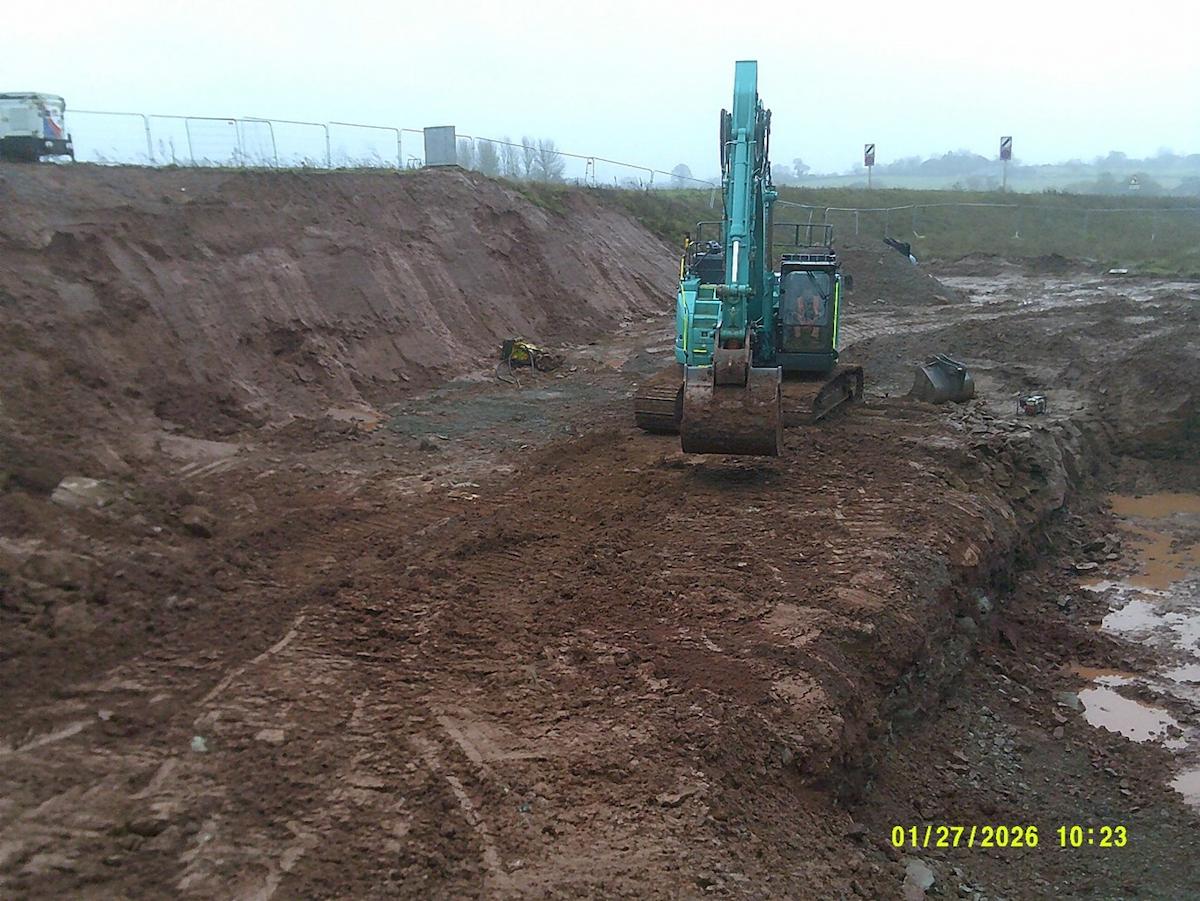 A picture of a digger digging