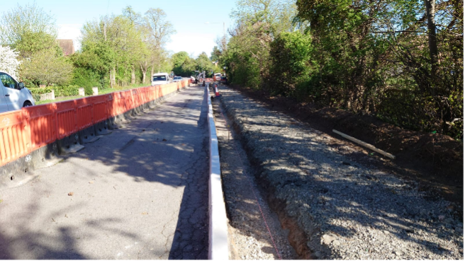 Kerbing being put in for widened footpath