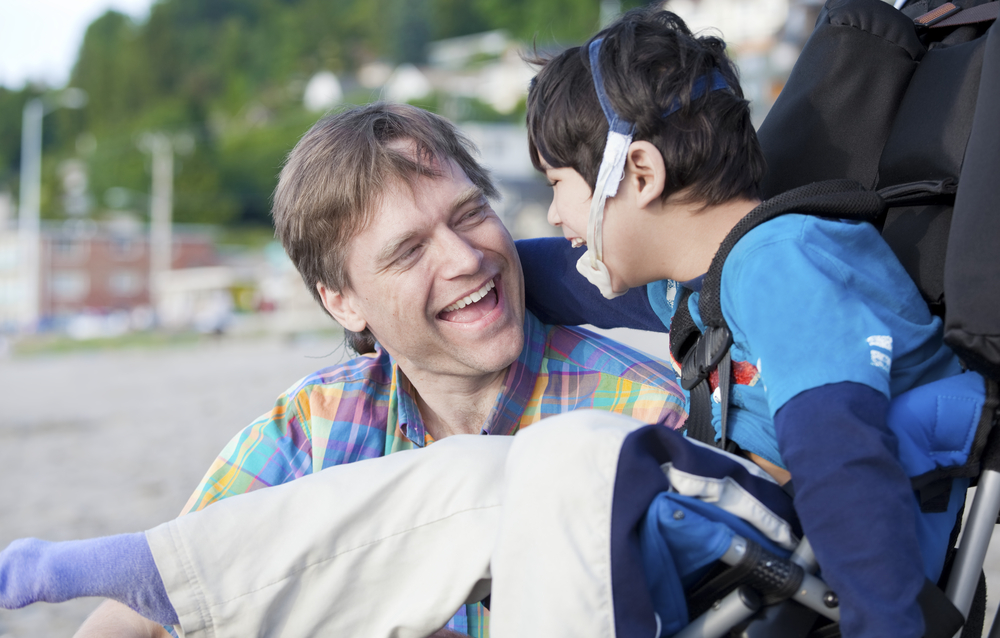 Family link carer laughs with child