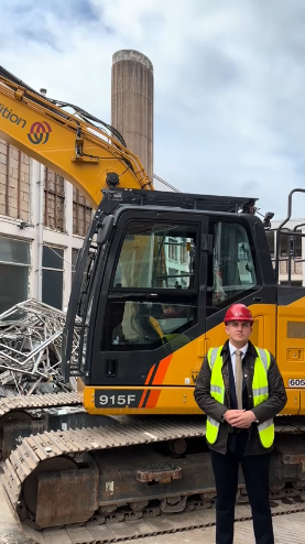 Cllr George Finch at the demolition site.