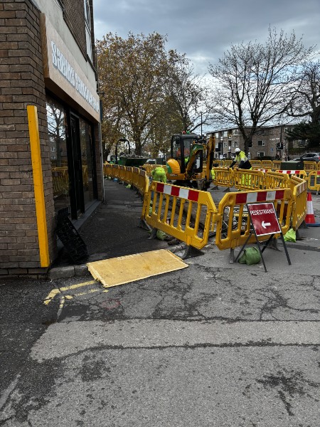 Photo of St Johns footpath and service road whilst work being carried out.