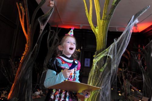 Child enjoying spooky fun