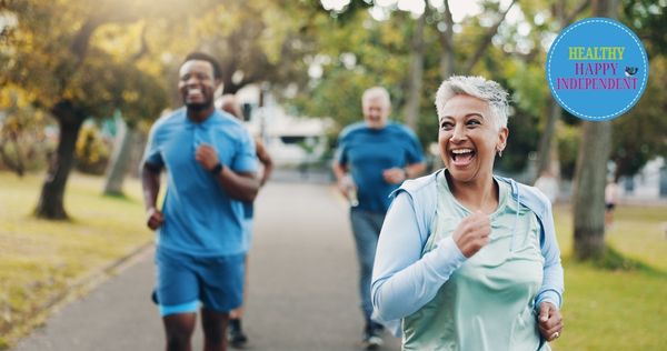 A group of people running in the park