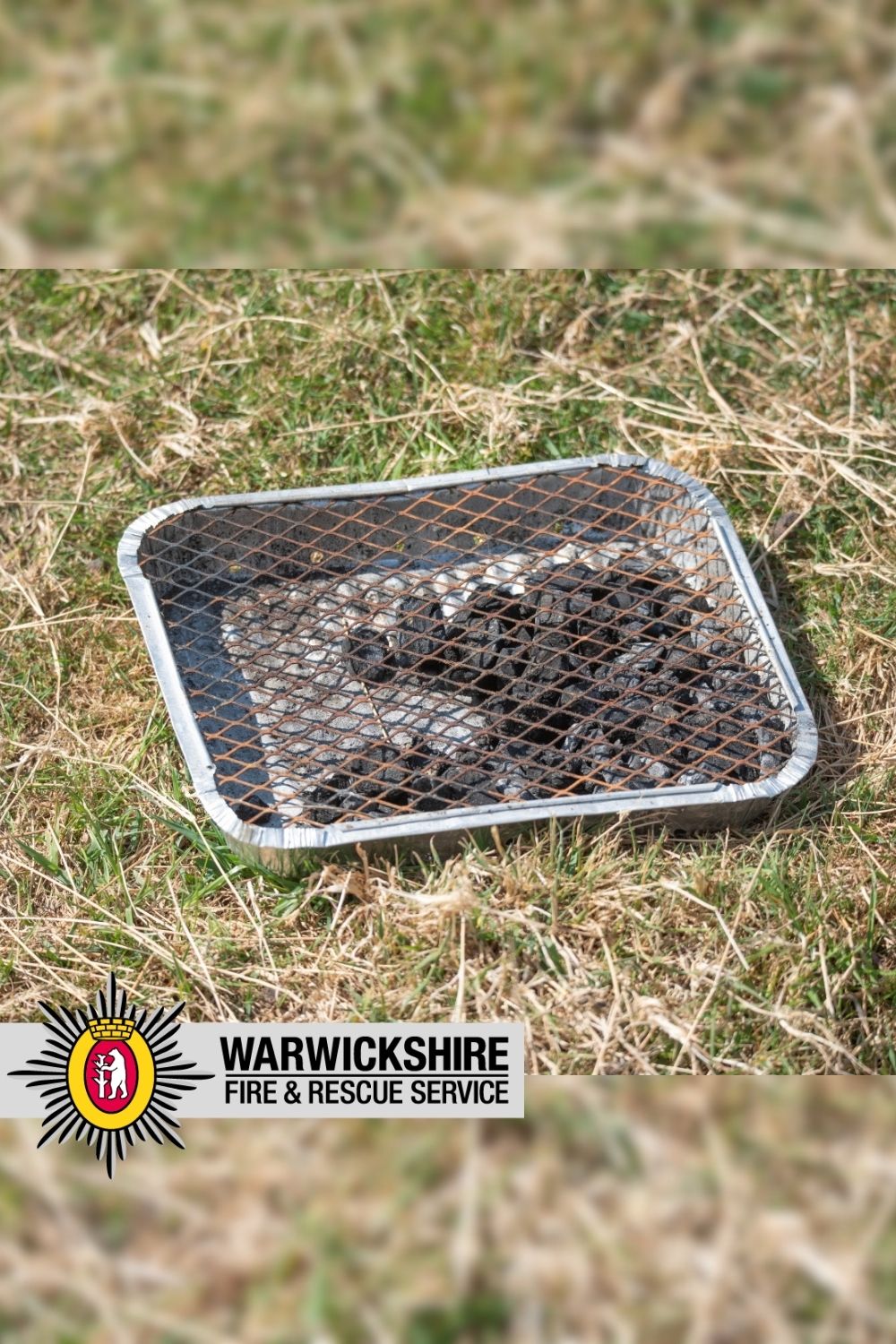 Disposable bbq on dry grass