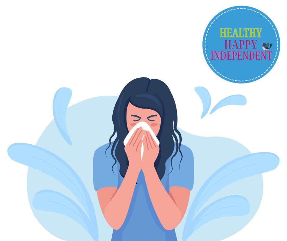 A person sneezing into a tissue.