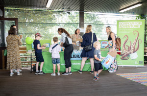 Npo people at library stand