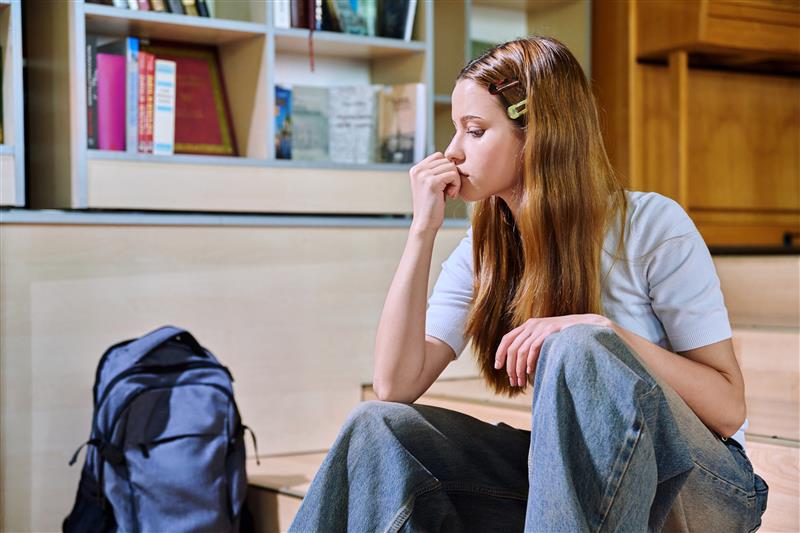 School girl looking troubled.